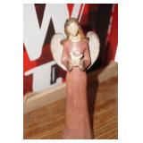 Angel holding a Dove Figurine