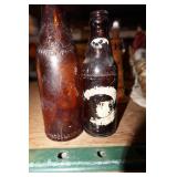 2 Brown Soda Bottles