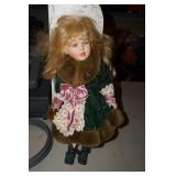 Porcelain Doll w/green coat