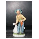 Grandpa Holding Sack & Carrots Figurine