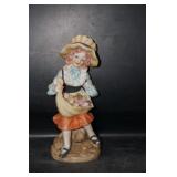 Young Lady w/Flowers in apron Figurine