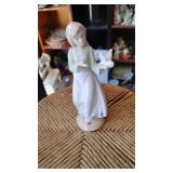 Figurine of Girl Holding a Bird