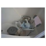 Collection of Bathroom Items and Shower Curtain