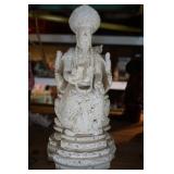 Concrete Statue of an Asian Man