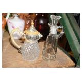 2 Cruet 1 plastic, 1 glass