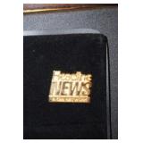 Headlines News Gold Tone Pin