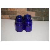 Four Cobalt Blue Vic Sav Bottles
