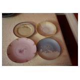 Four Demitasse Saucers