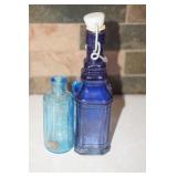 Two Blue Bottles