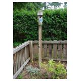 Wood Birdhouse on Pole in Left back corner of yard