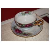 Cup and Saucer Set with Pink and Blue Flowers