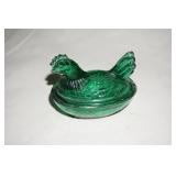 Small Green Chicken on  Nest