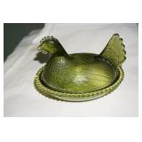 Green Chicken on Nest