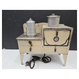 Vintage Tin Electric Toy Stove 12" x 11" high Vintage Tin Electric Toy Stove 12" x 11" high