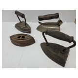4 Primitive Sad Irons