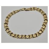 10k Gold Bracelet  7"  with XOXOXOXOX