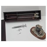 Hypodermic Syringe, Organ Grinder & Branding Iron