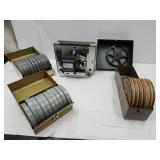 Bell & Howell Projector & 3 Cases of Reels