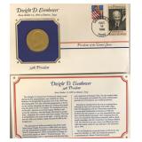 DWIGHT D EISENHOWER MEDALLION AND STAMPED POSTAGE