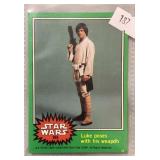 1977 STAR WARS ï¿½LUKE POSES WITH HIS WEAPONï¿½ CARD,