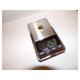 2.60 grams 10K Gold Pinback = SF College of