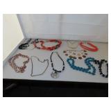 Quart Bag of Necklaces - some signed