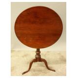 A 19TH CENTURY AMERICAN CHERRY TILT-TOP TABLE