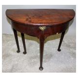 AN 18TH CENT GEORGE II DEMILUNE GATE LEG GAME TABL