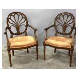 HEAVILY CARVED ARM CHAIRS WITH PRINCE OF WALES PLU