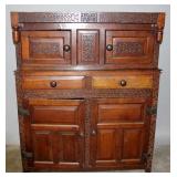 AN ENGLISH OAK COURT CUPBOARD DATED 1723
