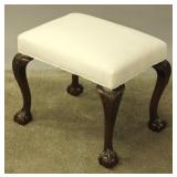 AN EARLY 19TH CENTURY CHIPPENDALE STOOL