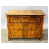A 19TH CENTURY BIEDERMEIER BURLED WOOD COMMODE