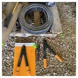 Three Fiskars Pruners And Landscaping Rail