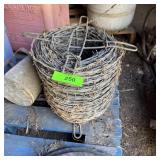 Roll Of Barbed Wire And Feed Scoop