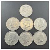 Seven miscellaneous date Kennedy Half Dollars