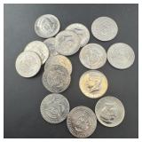 Fifteen mixed date Kennedy Half Dollars