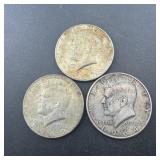 1964 Kennedy Half Dollar and two 40% silver halves