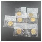 New Littleton Mint gold dollars, seven total