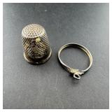 Silver thimble and ring