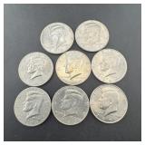 Eight Kennedy Half Dollars