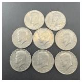 Eight miscellaneous Kennedy Half Dollars
