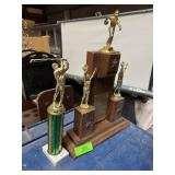 Trophies; Two assorted trophies.