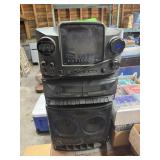 CD+G Karaoke Machine; Includes large lot of CDs.