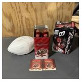 Collectible Budweiser memorabilia bottles and a si