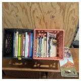 Assortment of wildlife information books, cookbook