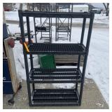 Four-shelf plastic shelving unit approximately 32.