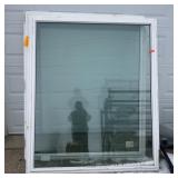 Two large fixture windows, approximately 60 inches