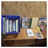 Assortment of fish, bird, animal, and cookbook boo