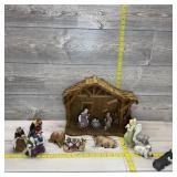 Nativity scene including 13-piece figurine set; Jo