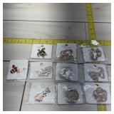 Lot of 10 mint brooches